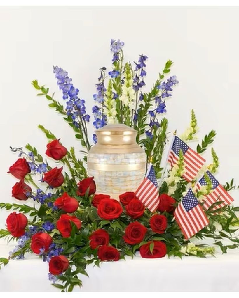 Glorious Cremation Arrangement with Red Roses